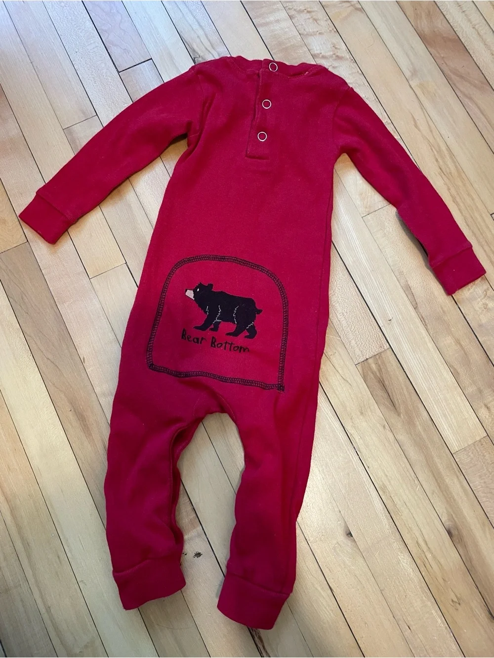 Lazy One Bear Bottoms red cotton baby onesie with black bear graphic Flap Jack